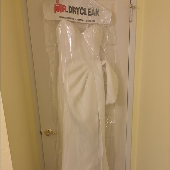 Jovani size 8 Strapless white gown with slit, side bow, and small tail. - Picture 1 of 10